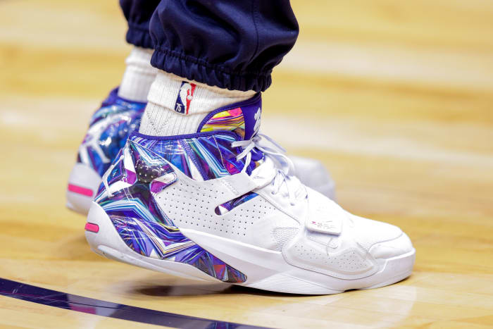 Blue and White Jordan Zion shoes.